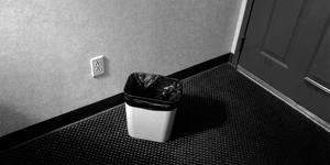 Trash bin in motel room